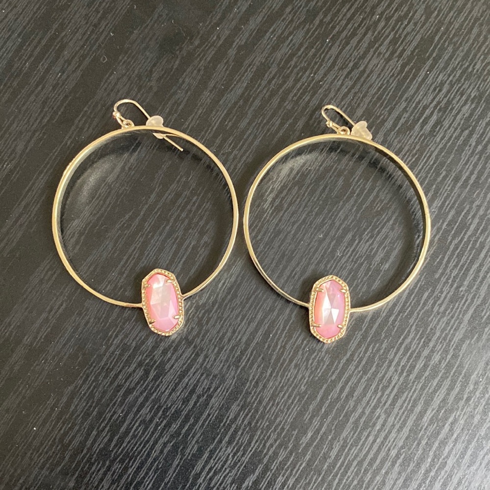 Kendra Scott gold with pink gemstone hoop earrings.